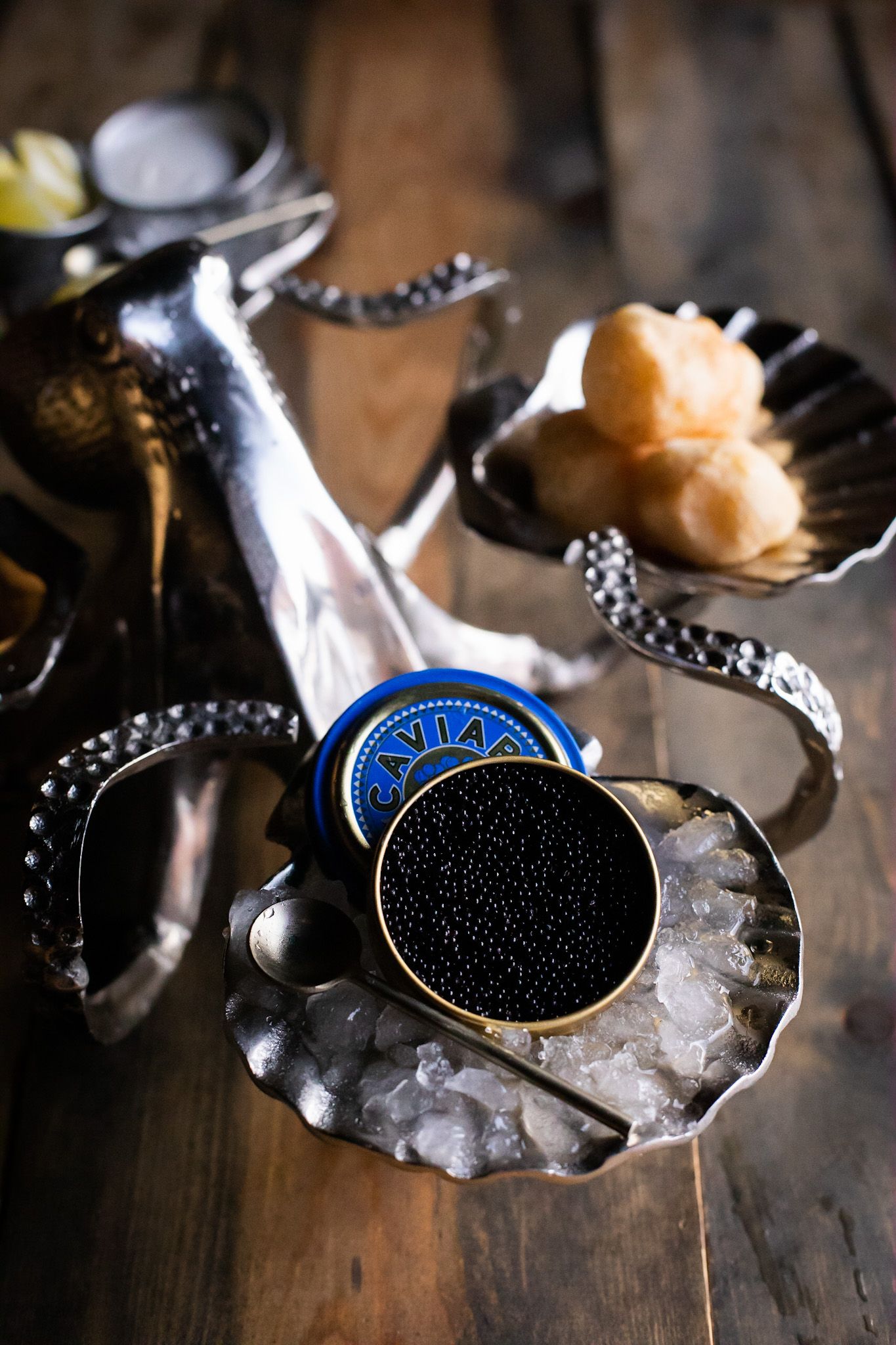 Baeri Caviar served with freshly baked paõ de queijo & crème fraîche 
